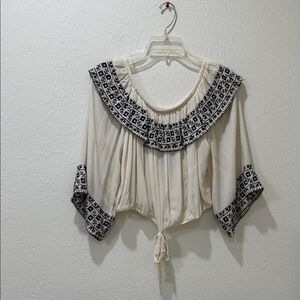 Elegant Cream Blouse with Black Patterns